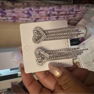 Silver tassel heart earrings